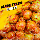 Fresh chamoy watermelon sours close-up showing sweet, tangy, and savory coating